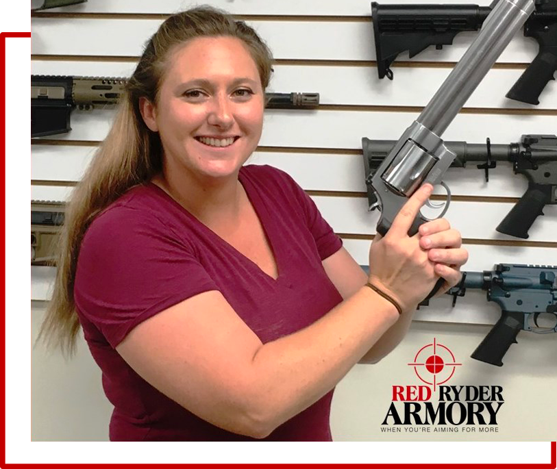 Customer reviewing a Smith & Wesson 500 Revolver sold at Red Ryder Armory Gun Store in Jacksonville FL