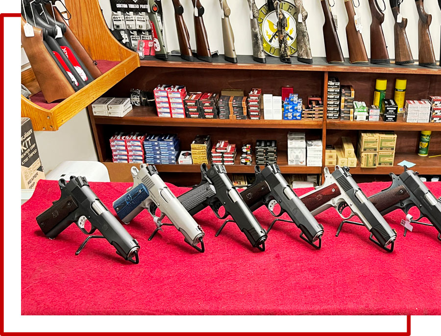 A row of 1911 Handguns sold at Red Ryder Armory