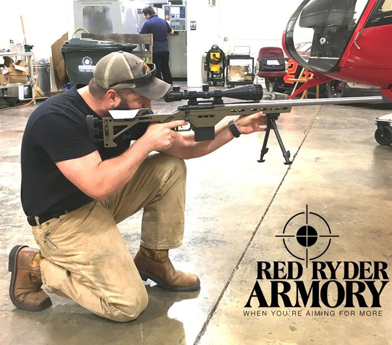 Man aiming a Custom Suppressed Rifle & Chassis by Red Ryder Armory